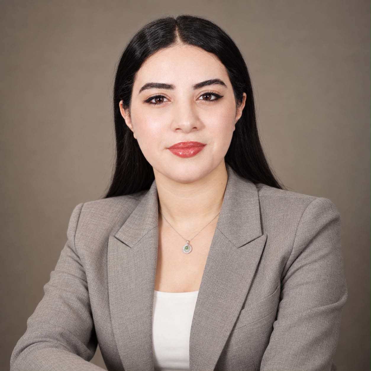 Professional portrait of Dr. Inass Bargaa, founder of ISOAIREC